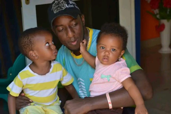 Bikamba Lucien with his Family